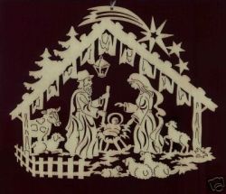 Рождественская вытынанка - бумажное украшение на окно